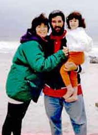 Robert and Cheryl Cox and daughter Samantha, 1995
