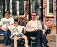 Douglas McCabe Edwards, center