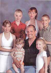 Joshua Eric Clifford and his wife Janna Louise Lee and their five children