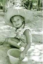 Abigail Lodge, July 1957 in the sand
